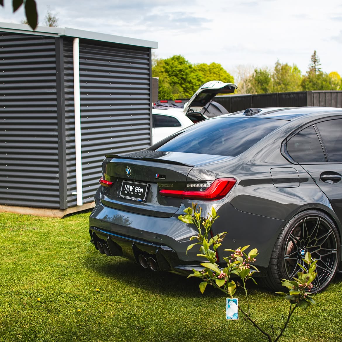 BMW M3 Competition — rear three-quarter